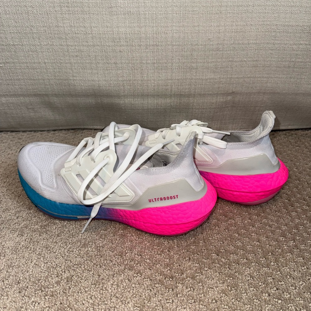 Adidas White and Pink Athletic Shoes with Dynamic Design